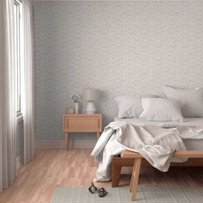 bedroom featuring the wallpaper, with a wooden nightstand and made bed
