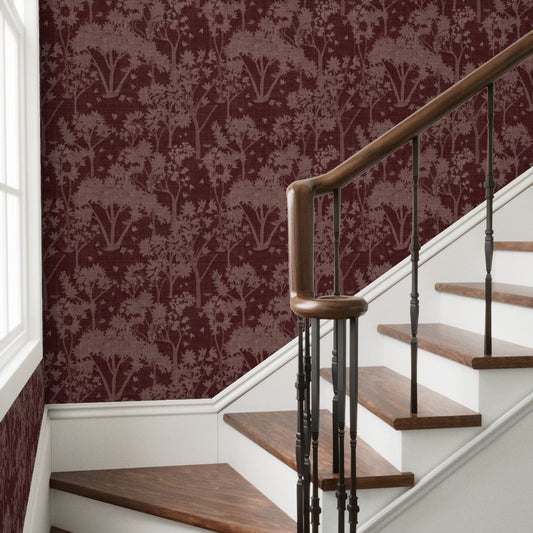 Staircase with wooden steps and a decorative railing showcasing the burgundy garden tapestry wallpaper.