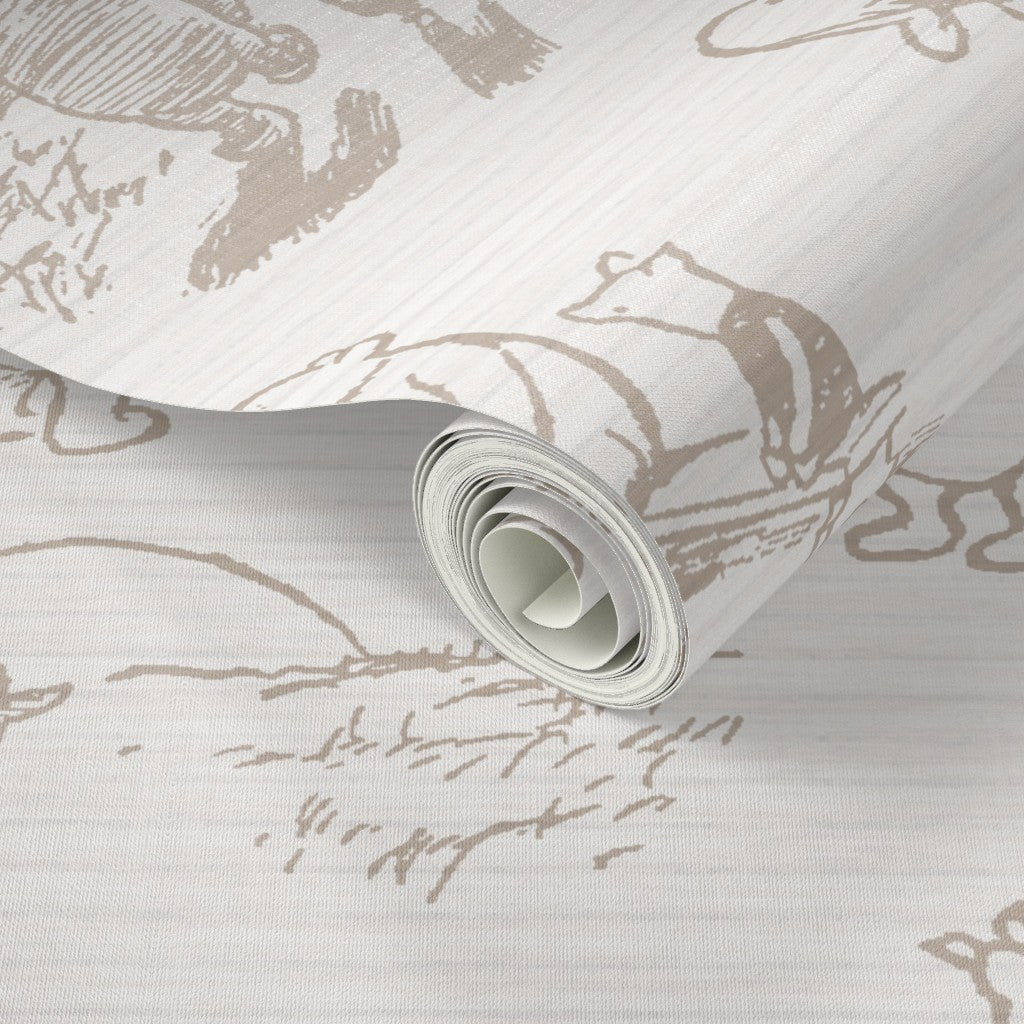 Roll of wallpaper with bear pattern on a light background