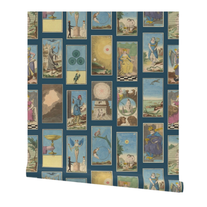 partially rolled wallpaper with a vintage-style tarot cards pattern arranged in a grid on a blue background