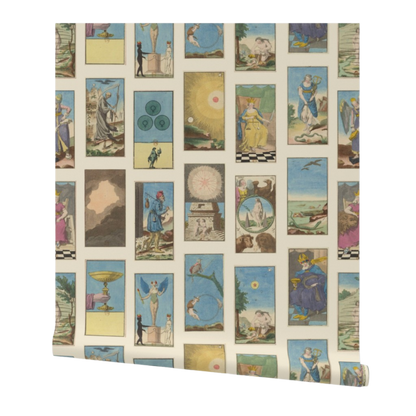 partially rolled wallpaper with a vintage-style tarot cards pattern arranged in a grid on a cream background