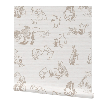 Roll of wallpaper with a vintage Winnie the Pooh pattern on a white background