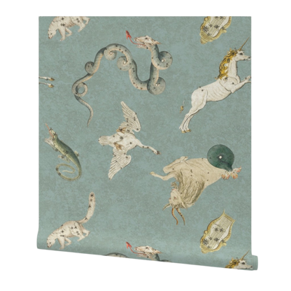 partially rolled wallpaper patterned with illustrations of mythical creatures on a jade background