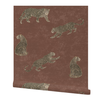 Moody cheetah wallpaper in rust brown with textured tadelakt background